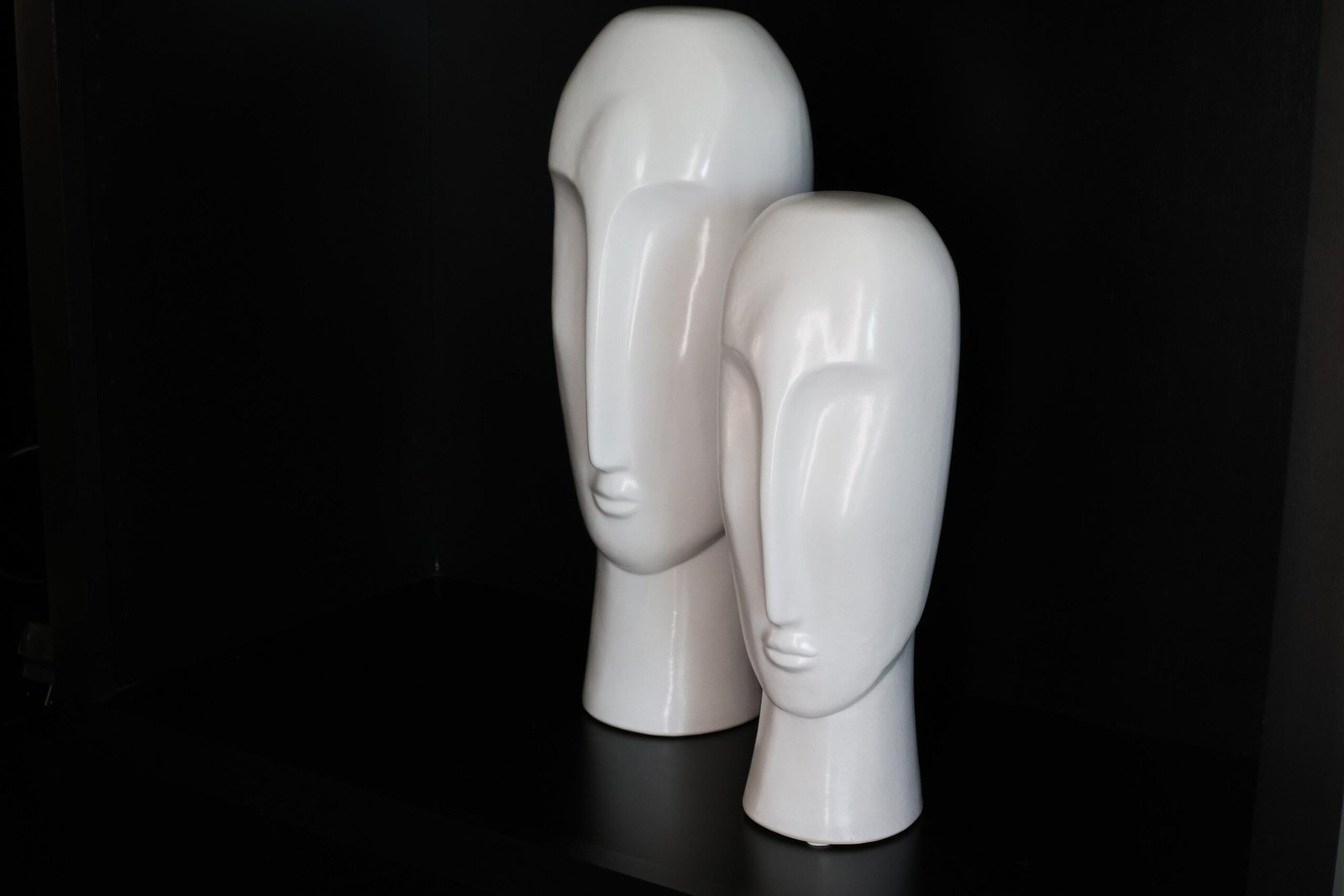 White Faces Statue